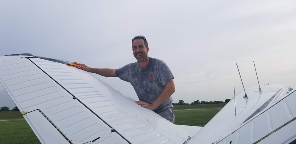 Brad-washes-Big-Boy-s-tail-feathers