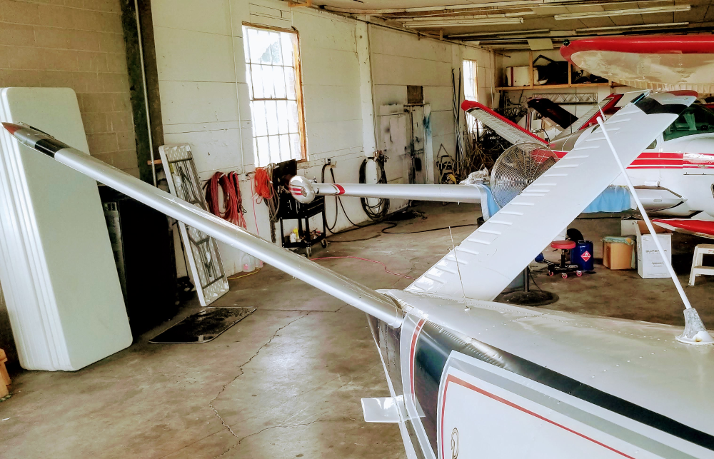 Maintenance-Day-Three-V-Tail-Bonanzas-in-a-line-Very