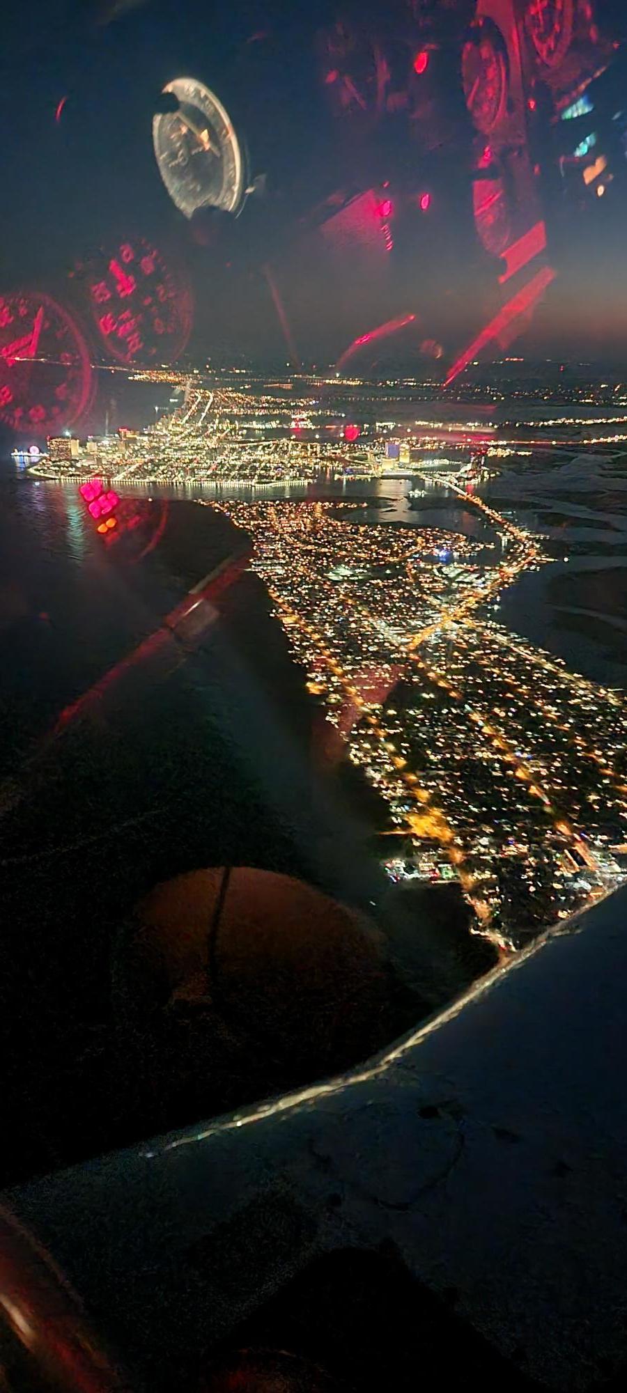 The-lights-of-Atlantic-City-below-with-the-reflection-of