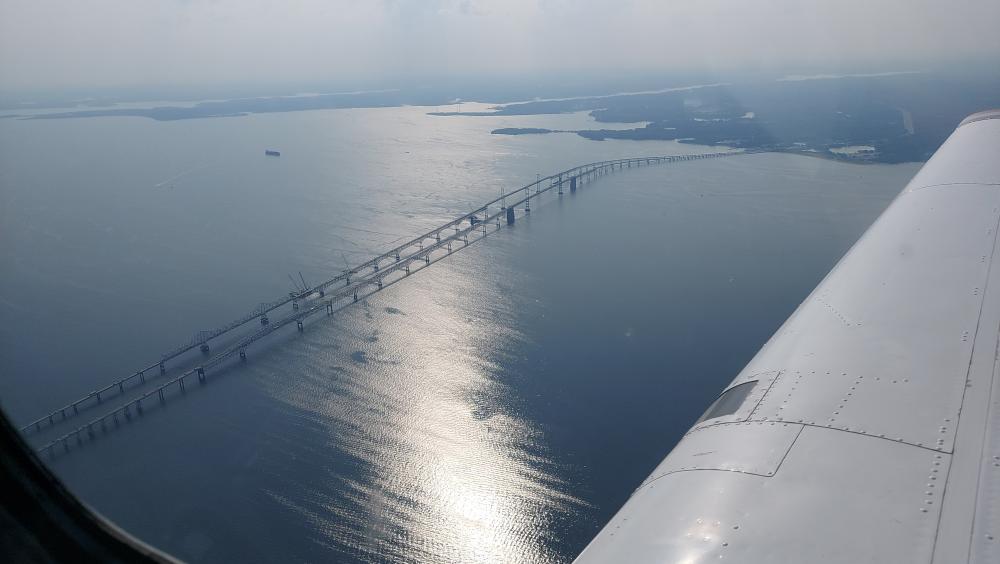 Flying-over-the-bridge-at-Bay-Bridge-Airport-W29-ATC