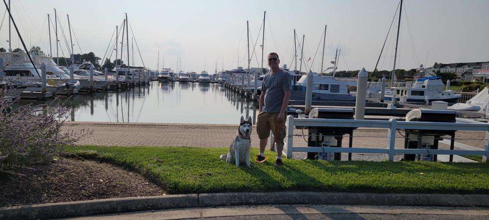 Shawn-and-Jasper-on-the-walk-through-the-marina-to