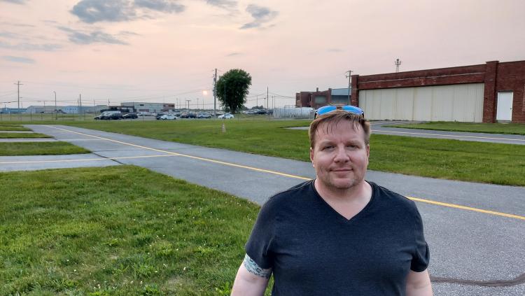 Zack-back-at-KLNS-with-the-sunset-in-the-background