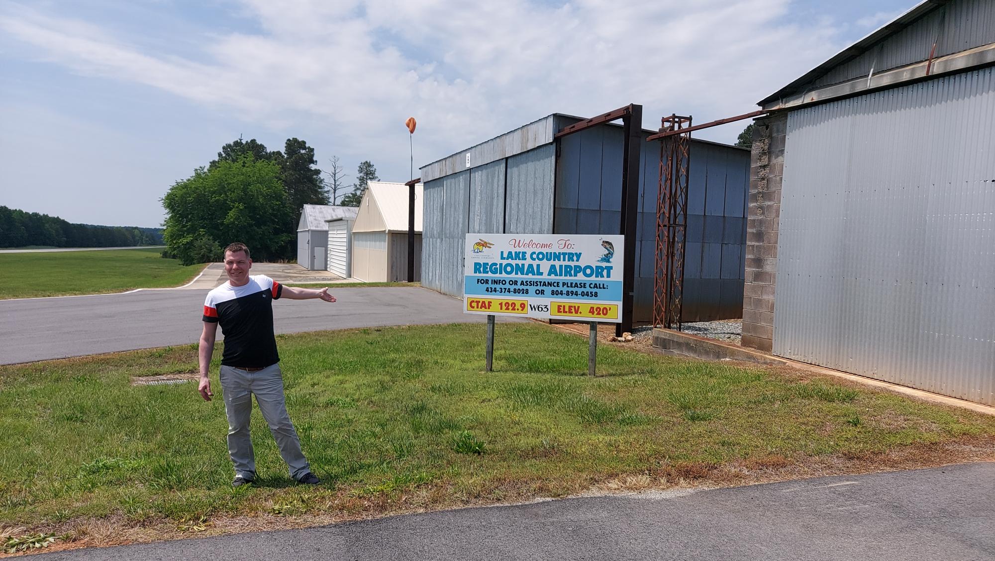 Shawn-in-front-of-the-sign-at-Lake-County-Regional