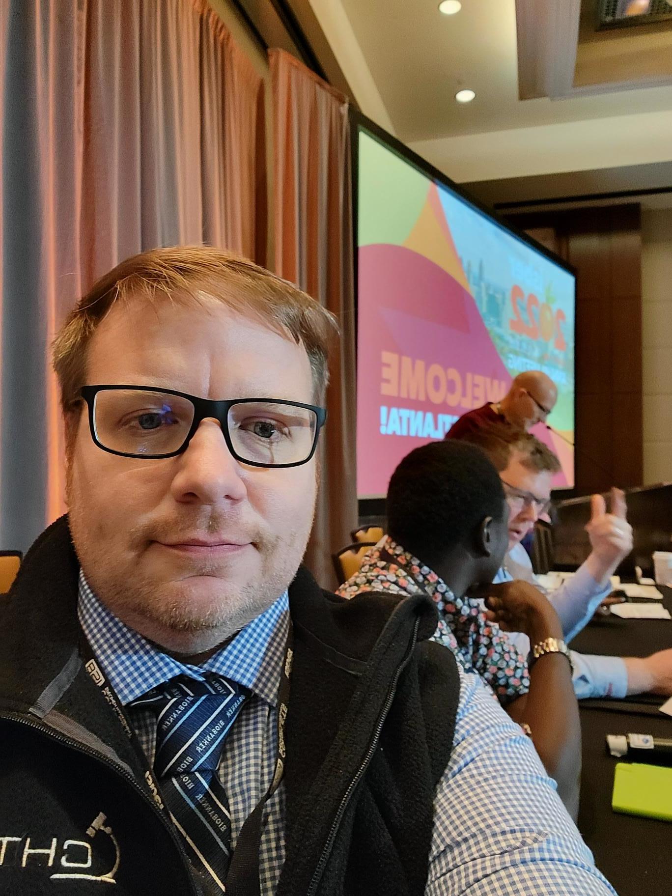Zack-getting-ready-for-the-conference-panel-discussion