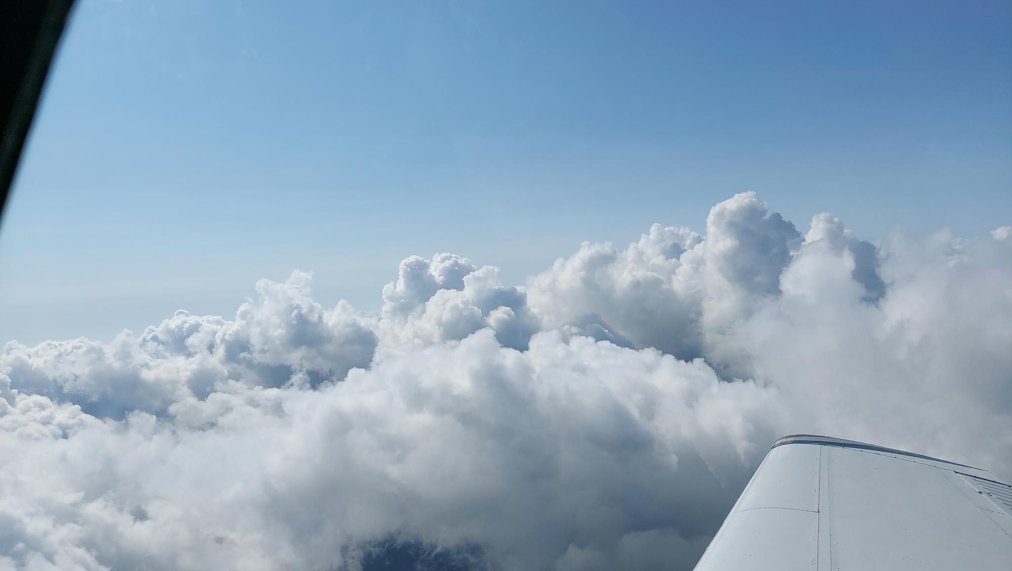 Leaving-Atlanta-climbing-out-through-the-clouds