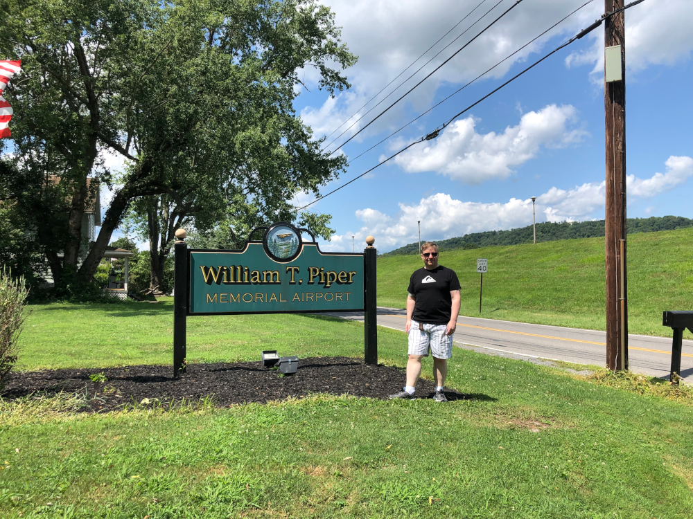 Zack-standing-in-front-of-the-sign-at-Lock-Haven