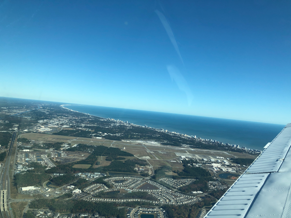Taking-off-from-Myrtle-Beach-International-with-the-downtown-strip