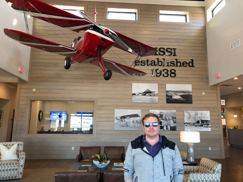 Zack-at-the-frontdesk-of-Golden-Isle-Aviation-GIA-at